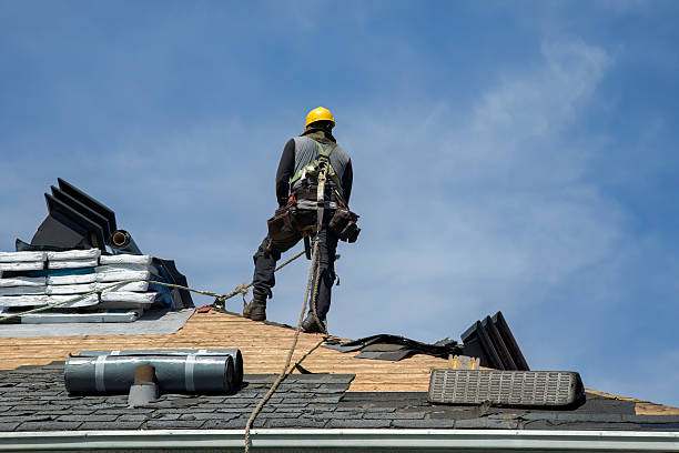 Professional Flat Roof Repair technician working in Schoolcraft, MI